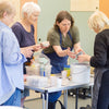 Group of people taking part in a ceramics class